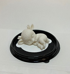 Фигура из шоколадной глазури Олененок на боку 4*6,5см